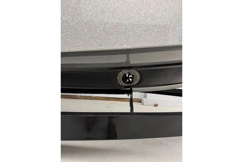 Slide: The Image of Close-up of Varatti Z2373 boat detail, 2026 model, featuring sleek black trim. - 8