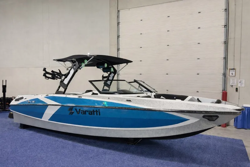 Slide: The Image of 2026 Varatti Z2373 boat displayed indoors on blue carpet. - 2