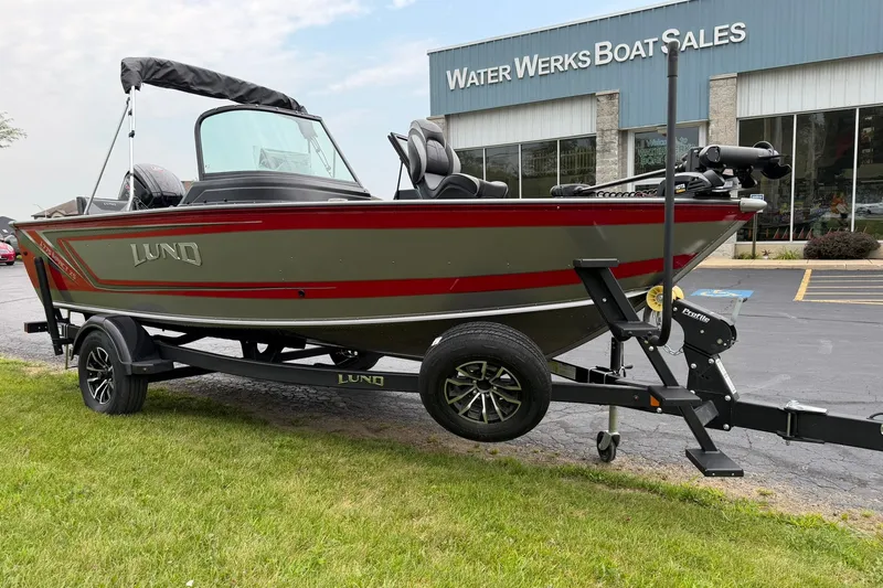 Slide: The Image of 2027 Lund 1775 Impact XS Sport boat on trailer at Water Werks Boat Sales. - 27