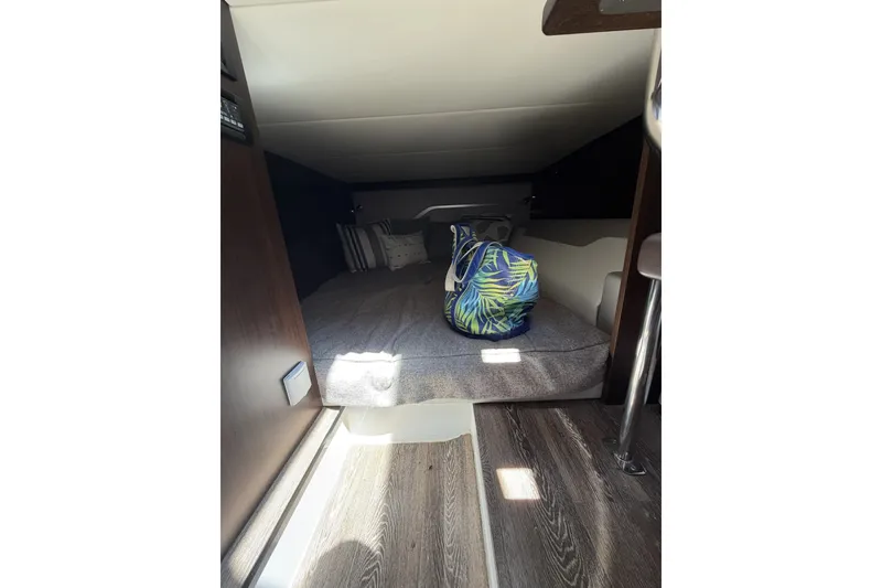 Slide: The Image of Interior cabin of 2024 Cruisers Yachts 42 GLS OB with bed and tropical bag. - 23
