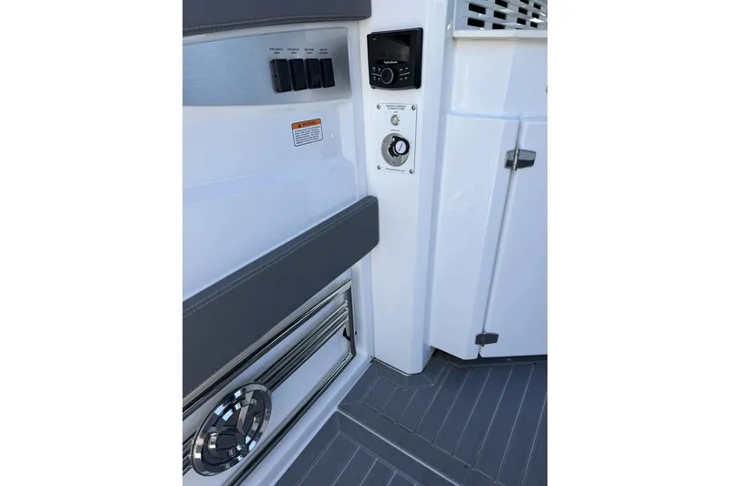 Slide: The Image of 2024 Cruisers Yachts 42 GLS OB interior detail with control panel and sleek design. - 25