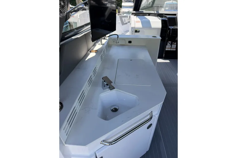 Slide: The Image of 2024 Cruisers Yachts 42 GLS OB interior with sleek sink and countertop design. - 17