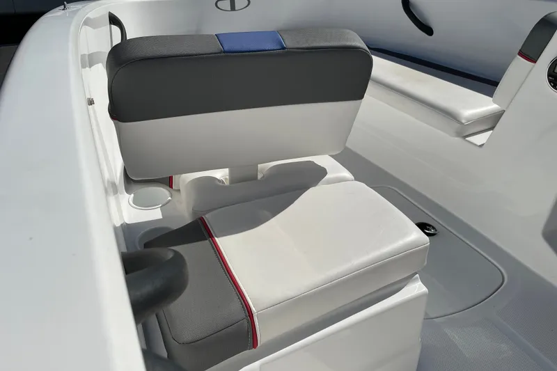 Slide: The Image of 2024 Tahoe T16 boat interior with cushioned seating and modern design. - 9