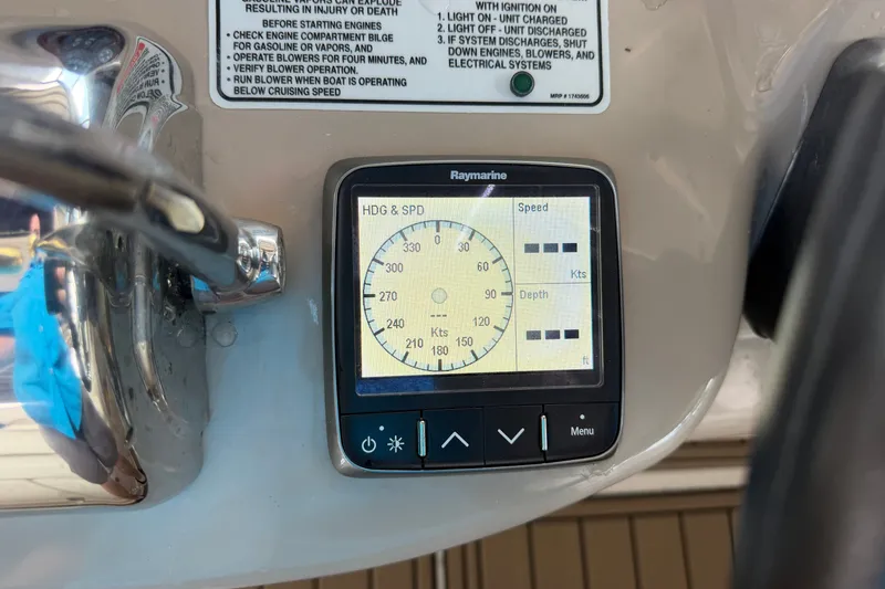 Slide: The Image of Raymarine display on 2004 Sea Ray Sundancer 320 showing heading and speed. - 36
