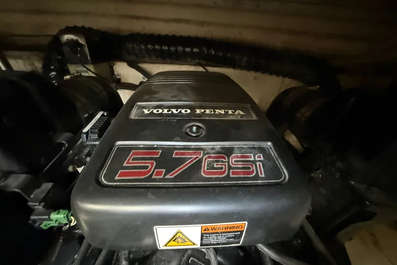 Slide: The Image of Volvo Penta 5.7 GSi engine in a 2000 Larson Cabrio 330 boat. - 54