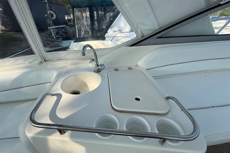 Slide: The Image of Larson Cabrio 330 boat interior with sink and countertop, 2000 model. - 15