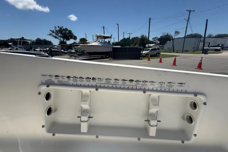 Slide: The Image of 2022 Key Largo 180 Center Console boat interior with fish measurement guide. - 42