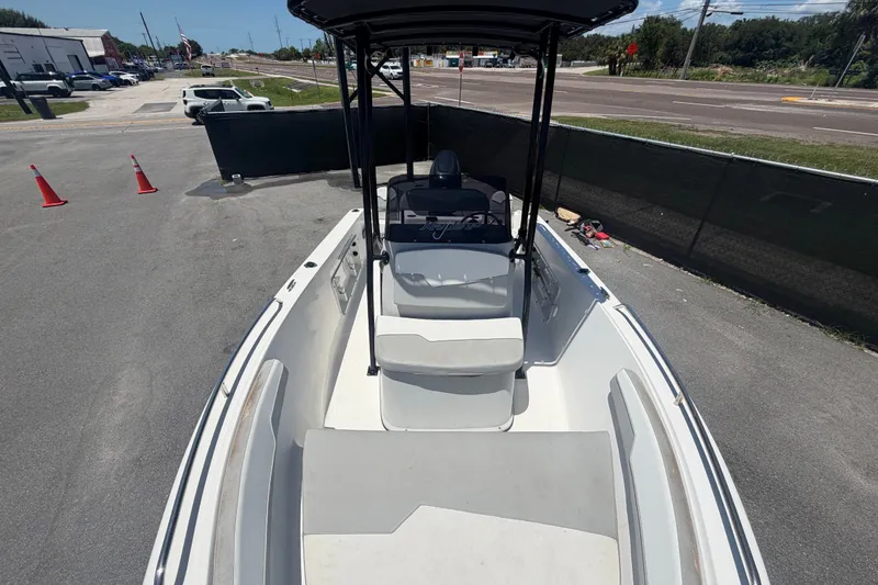 Slide: The Image of 2022 Key Largo 180 Center Console boat parked on pavement, viewed from above. - 33
