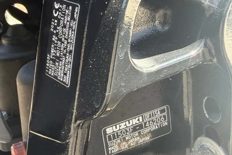 Slide: The Image of Close-up of Suzuki motor label on 2022 Key Largo 180 Center Console boat. - 54