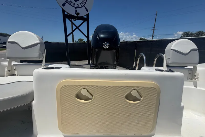 Slide: The Image of 2022 Key Largo 180 Center Console boat with Suzuki outboard motor, rear seating view. - 45