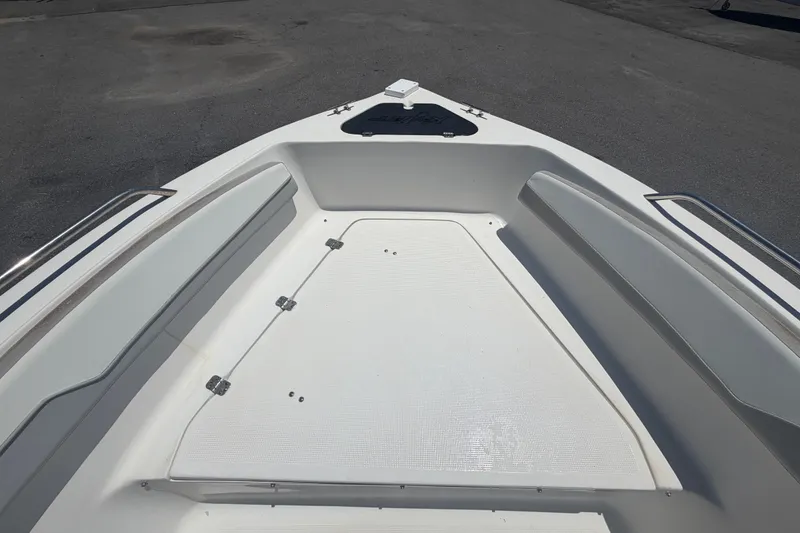 Slide: The Image of 2022 Key Largo 180 Center Console boat interior with spacious seating and storage. - 28