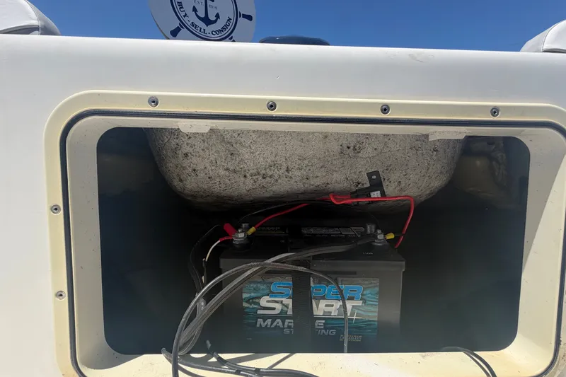 Slide: The Image of Battery compartment of a 2022 Key Largo 180 Center Console boat. - 47