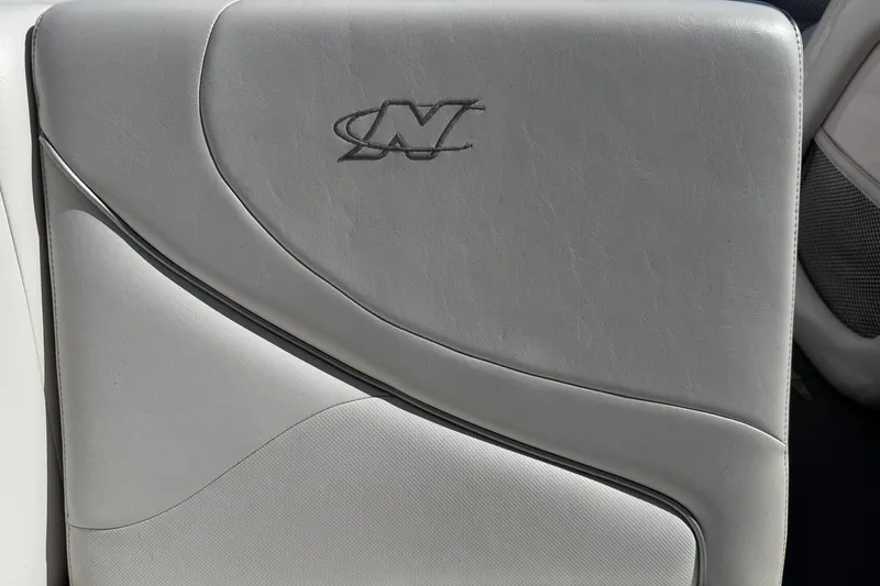 Slide: The Image of 2003 Nautique Air Nautique 226 boat seat with embroidered logo detail. - 35
