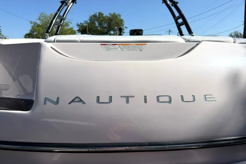 Slide: The Image of 2003 Nautique Air Nautique 226 boat rear view with logo and tower. - 21