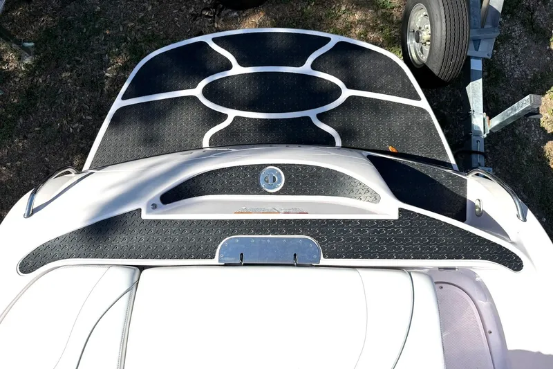 Slide: The Image of 2003 Nautique Air Nautique 226 boat deck with black and white traction pads. - 22