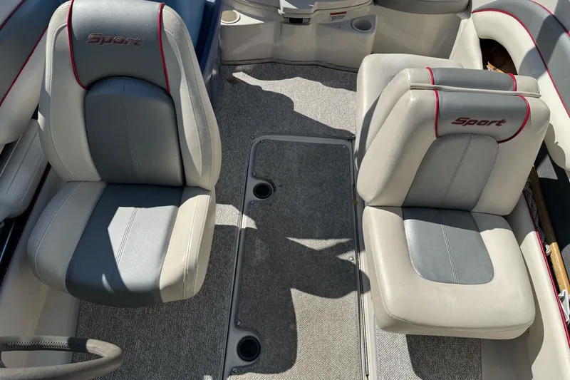 Slide: The Image of Interior of a 2008 Sea Ray 175 Sport boat with two cushioned seats. - 10