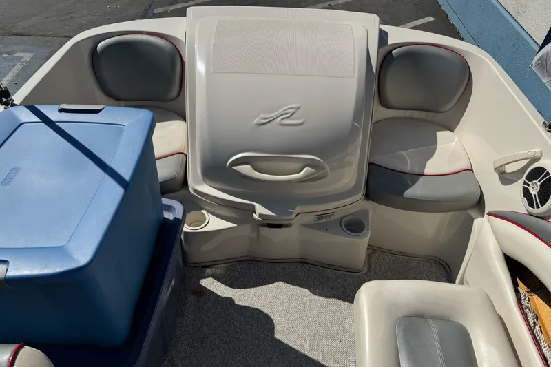 Slide: The Image of Interior of a 2008 Sea Ray 175 Sport boat with seating and storage. - 16