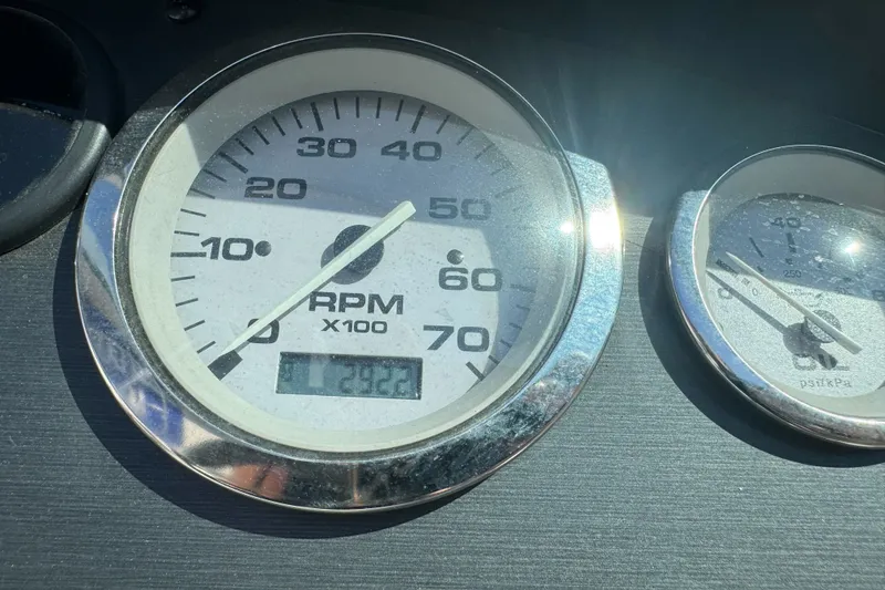 Slide: The Image of Close-up of Sea Ray 175 Sport 2008 boat tachometer showing RPM and hours. - 15