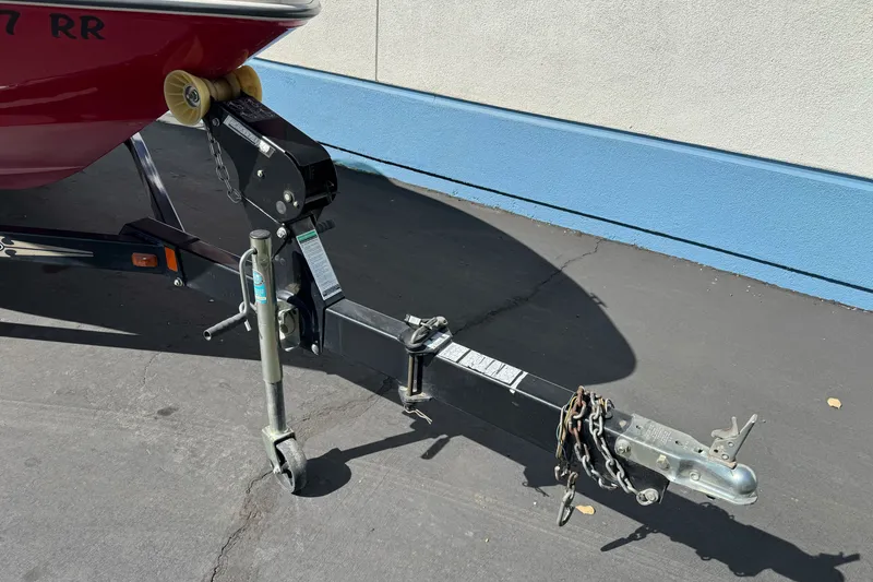 Slide: The Image of Trailer hitch of a 2008 Sea Ray 175 Sport boat on pavement. - 7