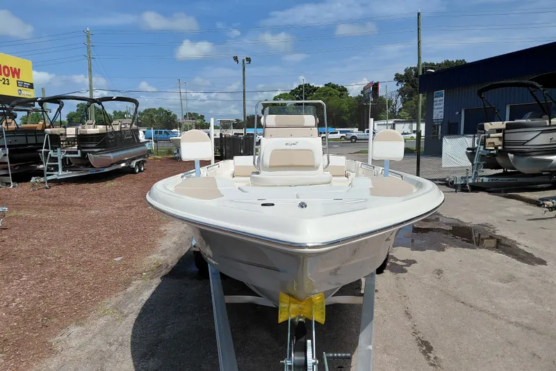 Slide: The Image of 2027 Bulls Bay 2200 XS boat displayed outdoors on a trailer. - 9