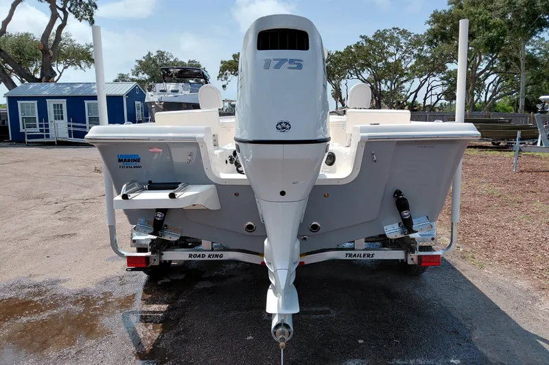 Slide: The Image of 2027 Bulls Bay 2200 XS boat on Road King trailer, rear view with outboard motor. - 4