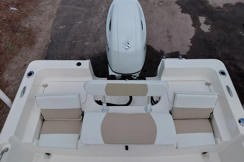 Slide: The Image of 2027 Bulls Bay 2200 XS boat with seating and outboard motor, top view. - 26