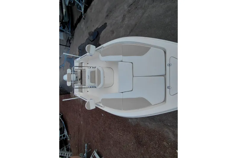 Slide: The Image of 2027 Bulls Bay 2200 XS boat, top view, showcasing seating and deck layout. - 13