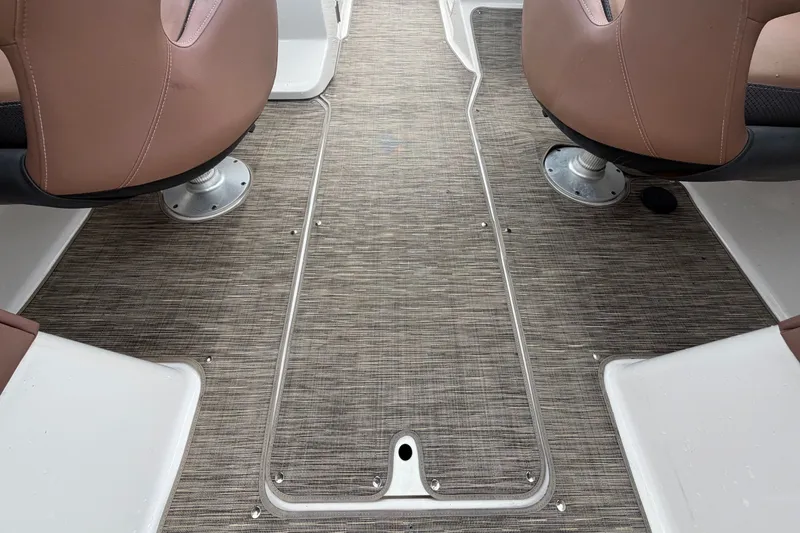 Slide: The Image of The floor of a 2018 Scarab 255 ID boat with two swivel seats. - 20