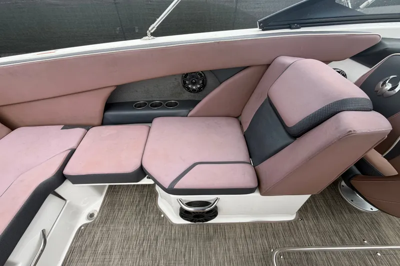 Slide: The Image of Luxurious seating on a 2018 Scarab 255 ID boat with pink and black upholstery. - 59
