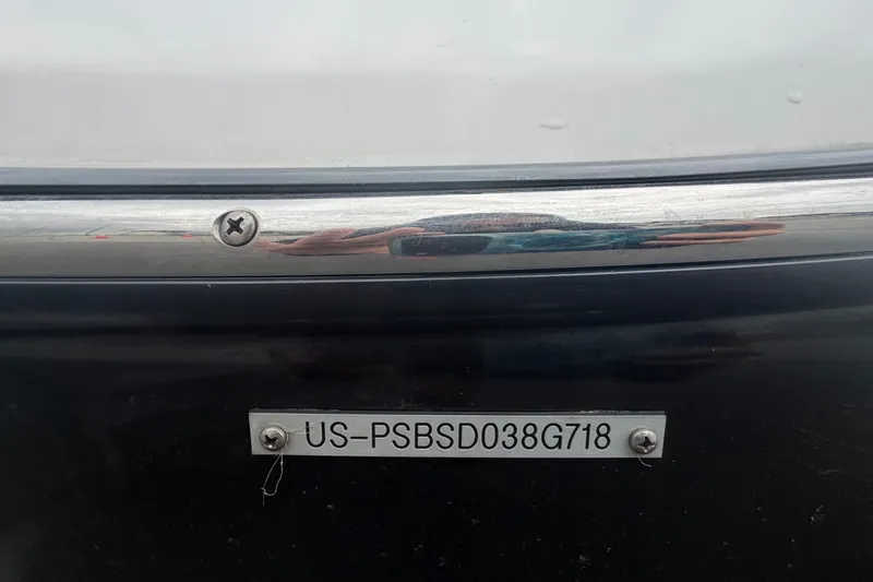 Slide: The Image of 2018 Scarab 255 ID boat with visible hull identification number plate. - 78
