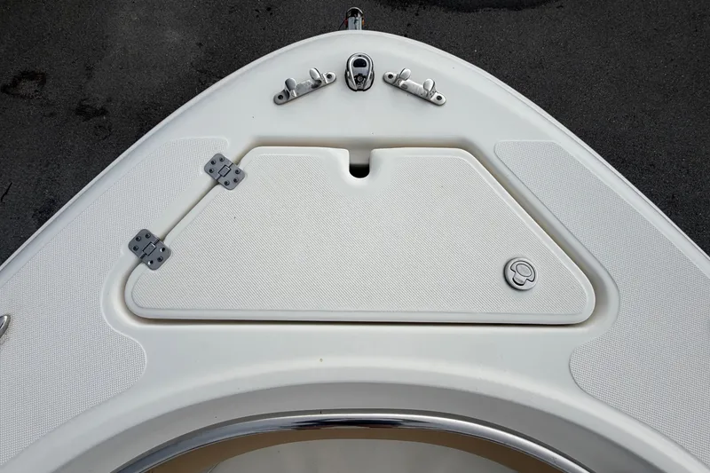Slide: The Image of Bow view of a Pioneer 222 Islander boat with storage compartment and fittings. - 43