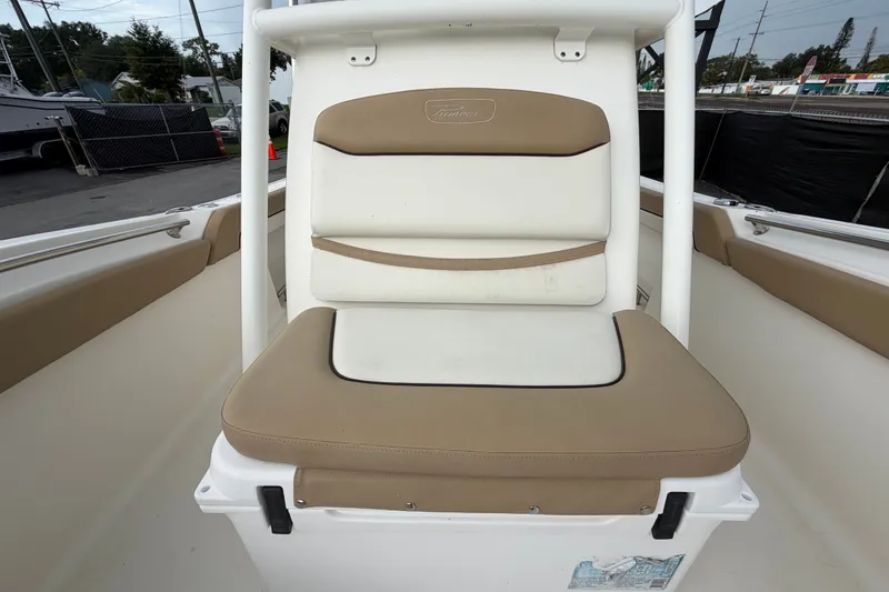 Slide: The Image of 2021 Pioneer 222 Islander boat seat with beige and white upholstery. - 50