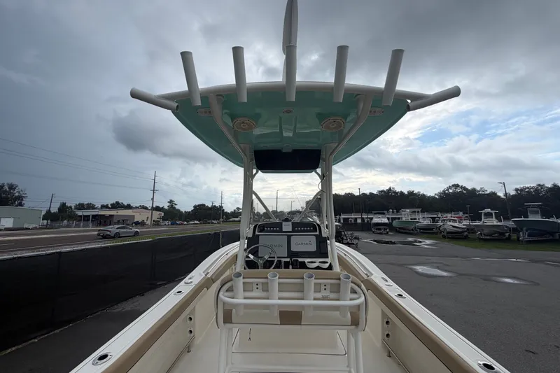 Slide: The Image of 2021 Pioneer 222 Islander boat with T-top and Garmin navigation system. - 14