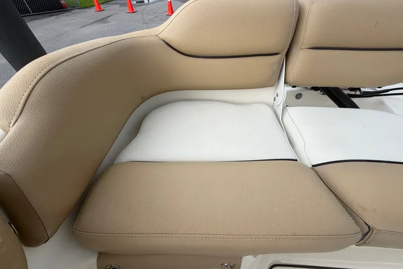Slide: The Image of Beige seating on 2021 Pioneer 222 Islander boat, showcasing comfortable design and craftsmanship. - 56