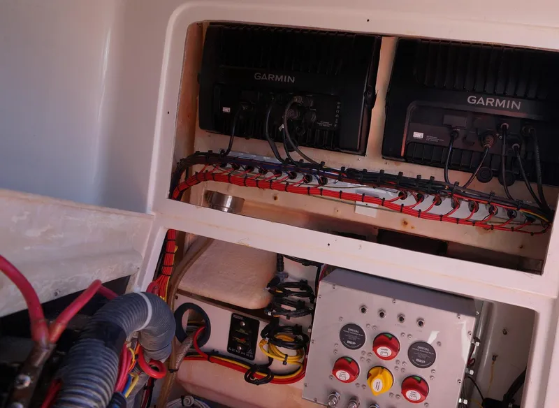 Slide: The Image of Electrical panel and wiring inside a 2015 Jupiter 30 FS boat. - 19