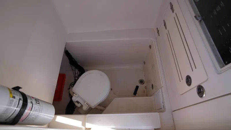 Slide: The Image of Boat bathroom interior with toilet and fire extinguisher, Jupiter 30 FS, 2015 model. - 18