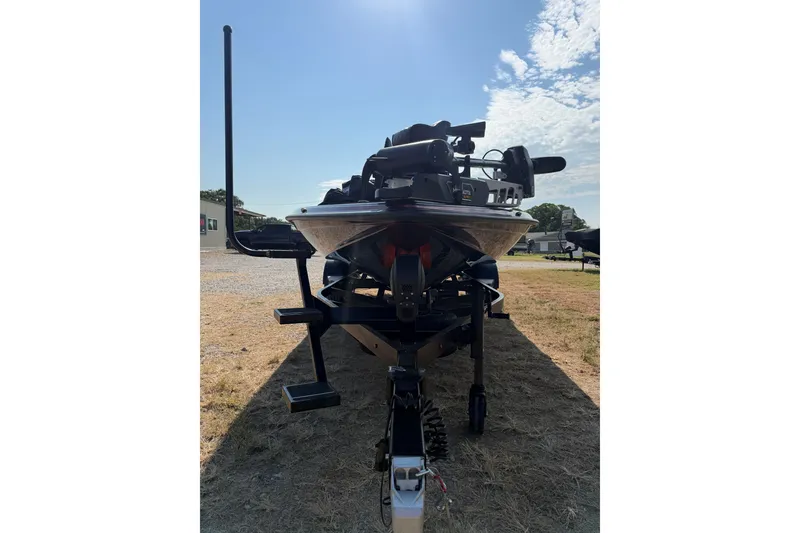 Slide: The Image of 2026 Phoenix 921 Elite X II boat on trailer under clear sky. - 3