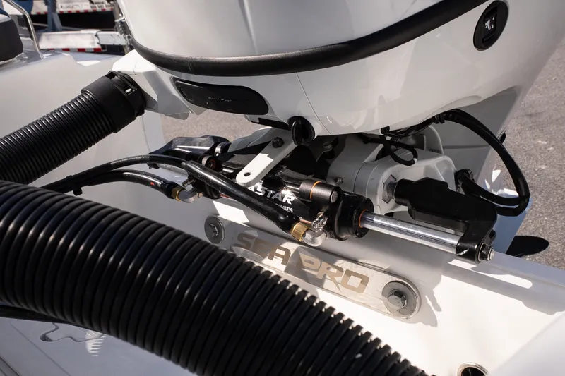 Slide: The Image of 2026 Sea Pro 202 Center Console boat engine detail with hydraulic steering system. - 20