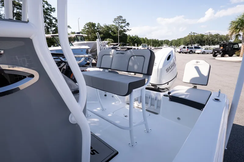 Slide: The Image of 2026 Sea Pro 202 Center Console boat with seating and Suzuki outboard motor. - 16