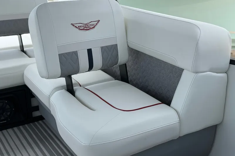 Slide: The Image of Luxury seating in 2027 Bennington 26 MSB USA 250 Limited Edition boat, featuring elegant white upholstery. - 14