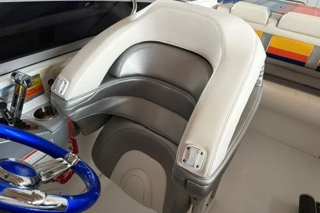 Slide: The Image of 2008 Formula 353 FASTech boat interior with plush seating and blue steering wheel. - 14