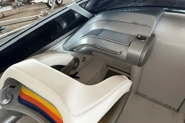 Slide: The Image of 2008 Formula 353 FASTech boat interior with white seating and sleek dashboard design. - 15