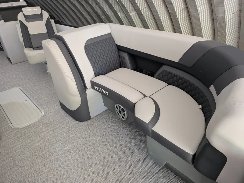 Slide: The Image of Interior of a Sylvan L3 LZ DH boat with gray and black upholstery. - 9