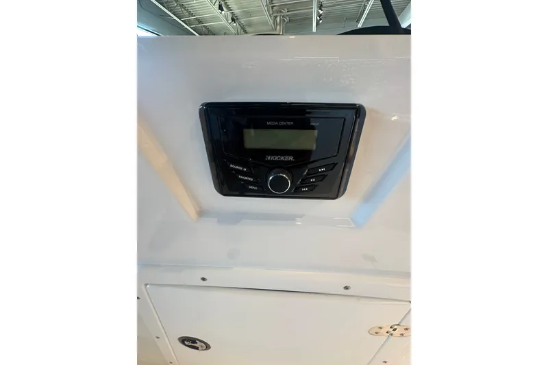 Slide: The Image of Kicker media center in 2027 Tahoe 1950 boat interior. - 15
