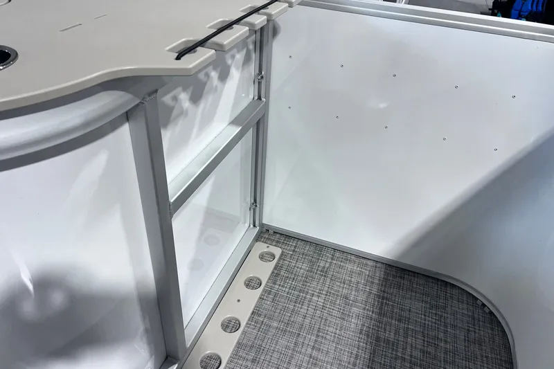 Slide: The Image of Interior view of 2026 SunCatcher Select 18F boat, featuring sleek design and modern materials. - 24
