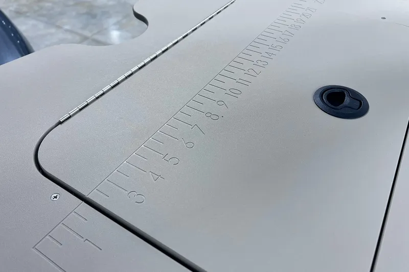 Slide: The Image of Close-up of SunCatcher Select 18F 2026 model with ruler markings and hinge detail. - 22