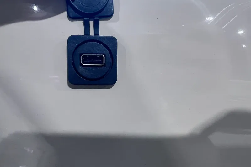 Slide: The Image of USB port on SunCatcher Select 18F 2026 model, mounted on a white surface. - 18