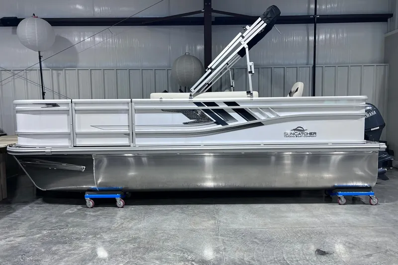 The Image of 2026 SunCatcher Select 18F pontoon boat in a showroom, side view. - 1