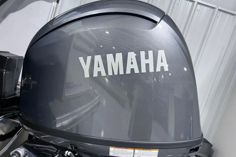Slide: The Image of Yamaha outboard motor on 2026 SunCatcher Select 18F boat, metallic finish. - 34