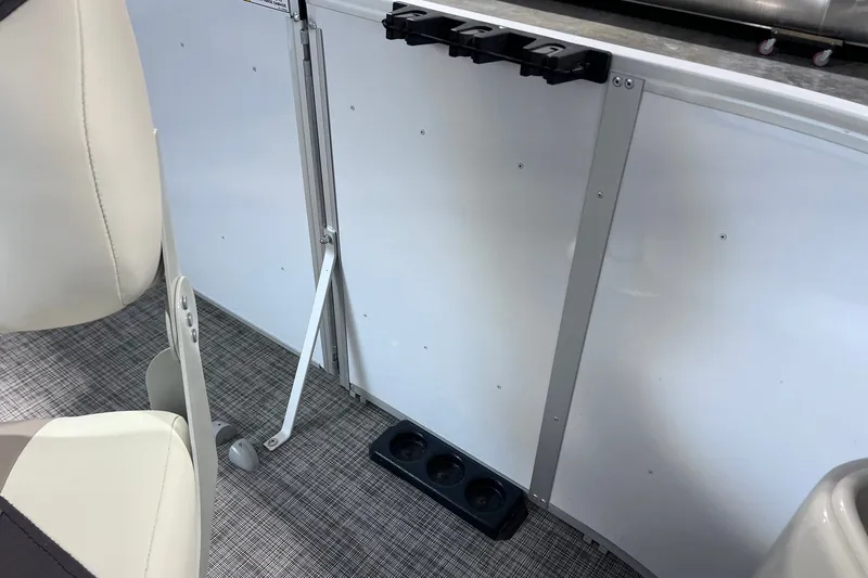 Slide: The Image of Interior of 2026 SunCatcher Select 18F boat with cup holders and seating. - 27